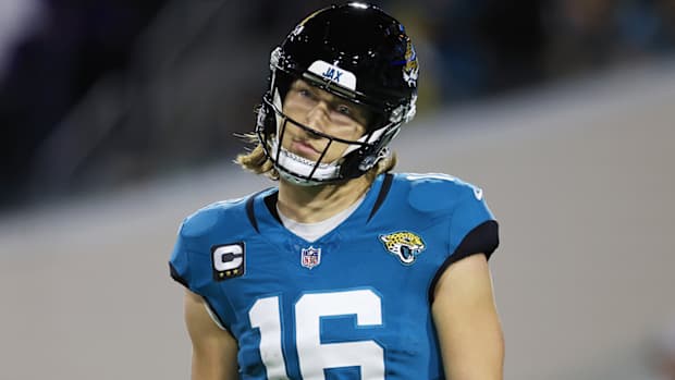 Trevor Lawrence reacts after a play.
