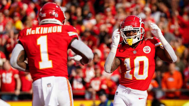 Jan 1, 2023; Kansas City, Missouri, USA; Kansas City Chiefs running back Isiah Pacheco (10) celebrates with running back Jerick McKinnon (1) after scoring a touchdown during the first half against the Denver Broncos at GEHA Field at Arrowhead Stadium. Mandatory Credit: Jay Biggerstaff-USA TODAY Sports  