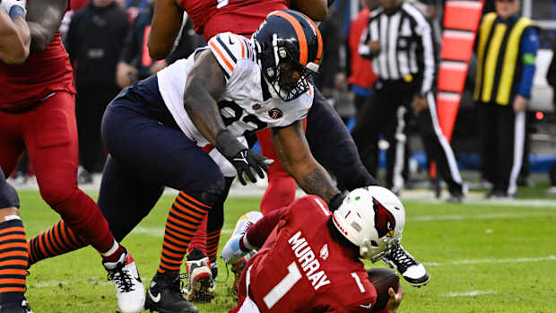 Chicago Bears defensive tackle Justin Jones (93) sacks Arizona Cardinals quarterback Kyler Murray (1) during the first half at Soldier Field.