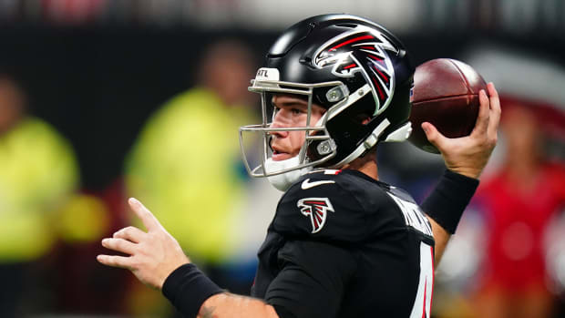 Atlanta Falcons quarterback Taylor Heinicke (4) looks to pass against the Indianapolis Colts during the first half at Mercedes-Benz Stadium.