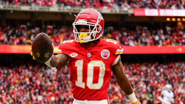 Dec 25, 2023; Kansas City, Missouri, USA; Kansas City Chiefs running back Isiah Pacheco (10) scores a touchdown during the first half against the Las Vegas Raiders at GEHA Field at Arrowhead Stadium. Mandatory Credit: Jay Biggerstaff-USA TODAY Sports  