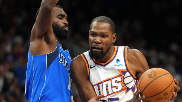 Phoenix Suns forward Kevin Durant (35) drives against Dallas Mavericks forward Tim Hardaway Jr. (10) during the first half at Footprint Center.