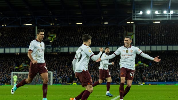 Manchester City players pictured celebrating following a goal scored by Julian Alvarez (center) during a 3-1 win at Everton in December 2023