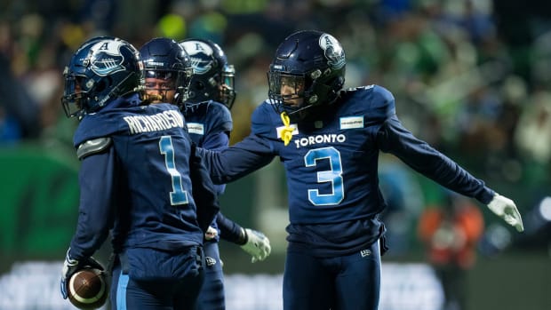 Nov 20, 2022; Regina, Saskatchewan, CAN; Toronto Argonauts defensive back Shaquille Richardson (1) and defensive back Jamal Peters (3) celebrate Richardson s interception against the Winnipeg Blue Bombers in the second half. The Argonauts defeated the Blue Bombers to win the 2022 Grey Cup Championship at Mosaic Stadium. Toronto won 24-23. Mandatory Credit: Bob Frid-USA TODAY Sports  