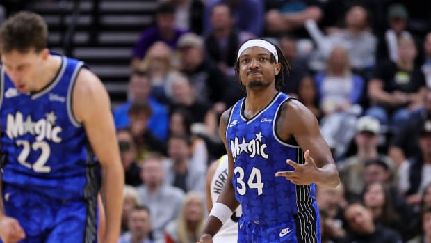 Nov 2, 2023; Salt Lake City, Utah, USA; Orlando Magic center Wendell Carter Jr. (34) reacts to a three point shot against the Utah Jazz in the second half at the Delta Center.