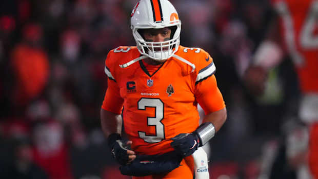 Dec 24, 2023; Denver, Colorado, USA; Denver Broncos quarterback Russell Wilson (3) before the game against the New England Patriots at Empower Field at Mile High. Mandatory Credit: Ron Chenoy-USA TODAY Sports  