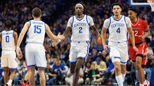 Dec 29, 2023; Lexington, Kentucky, USA; Kentucky Wildcats forward Aaron Bradshaw (2) celebrates with guard Reed Sheppard (15) during the first half against the Illinois State Redbirds at Rupp Arena at Central Bank Center. Mandatory Credit: Jordan Prather-USA TODAY Sports