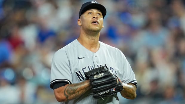 Frankie Montas leaves the field in a game against the Royals.