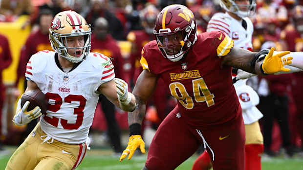 Christian McCaffrey Daron Payne 49ers