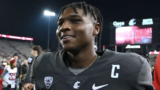 Washington State Cougars quarterback Cameron Ward celebrates his team’s win over the Colorado Buffaloes on Nov. 17, 2023.