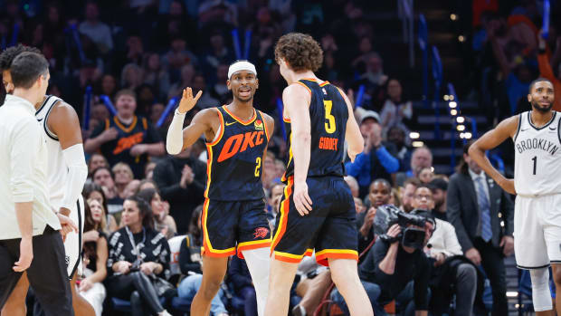 Dec 31, 2023; Oklahoma City, Oklahoma, USA; Oklahoma City Thunder guard Shai Gilgeous-Alexander (2) and Oklahoma City Thunder guard Josh Giddey (3) celebrate after a play against the Brooklyn Nets in the second half at Paycom Center.
