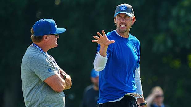 Indianapolis Colts head coach Shane Steichen speaks with General Manager Chris Ballard before the first day of training camp practice Wednesday, July 26, 2023, at Grand Park Sports Complex in Westfield, Indiana.  
