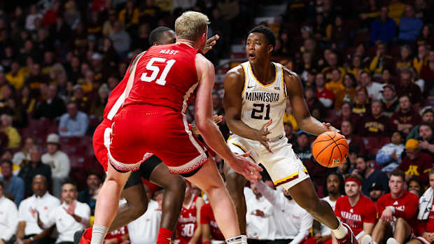 Pharrel Payne dribbles against Nebraska