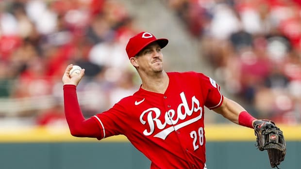 Kevin Newman throws to first base, July 24th, 2023