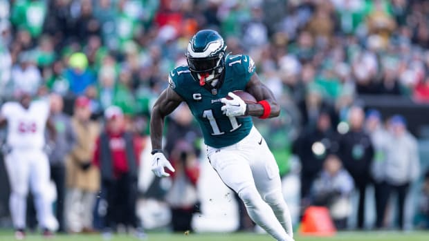 Dec 31, 2023; Philadelphia, Pennsylvania, USA; Philadelphia Eagles wide receiver A.J. Brown (11) runs with the ball during the fourth quarter against the Arizona Cardinals at Lincoln Financial Field.