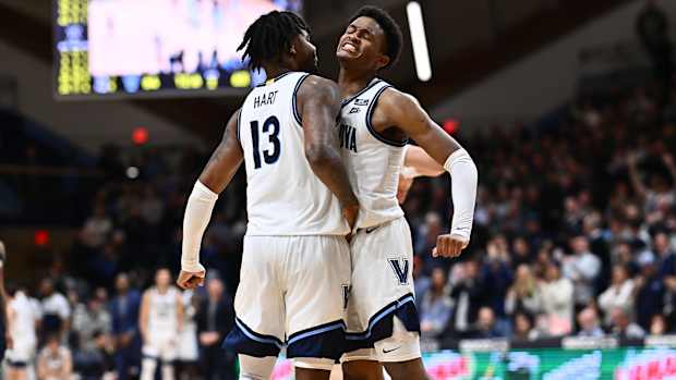 Villanova Wildcats guards Jordan Longino and Hakim Hart celebrate