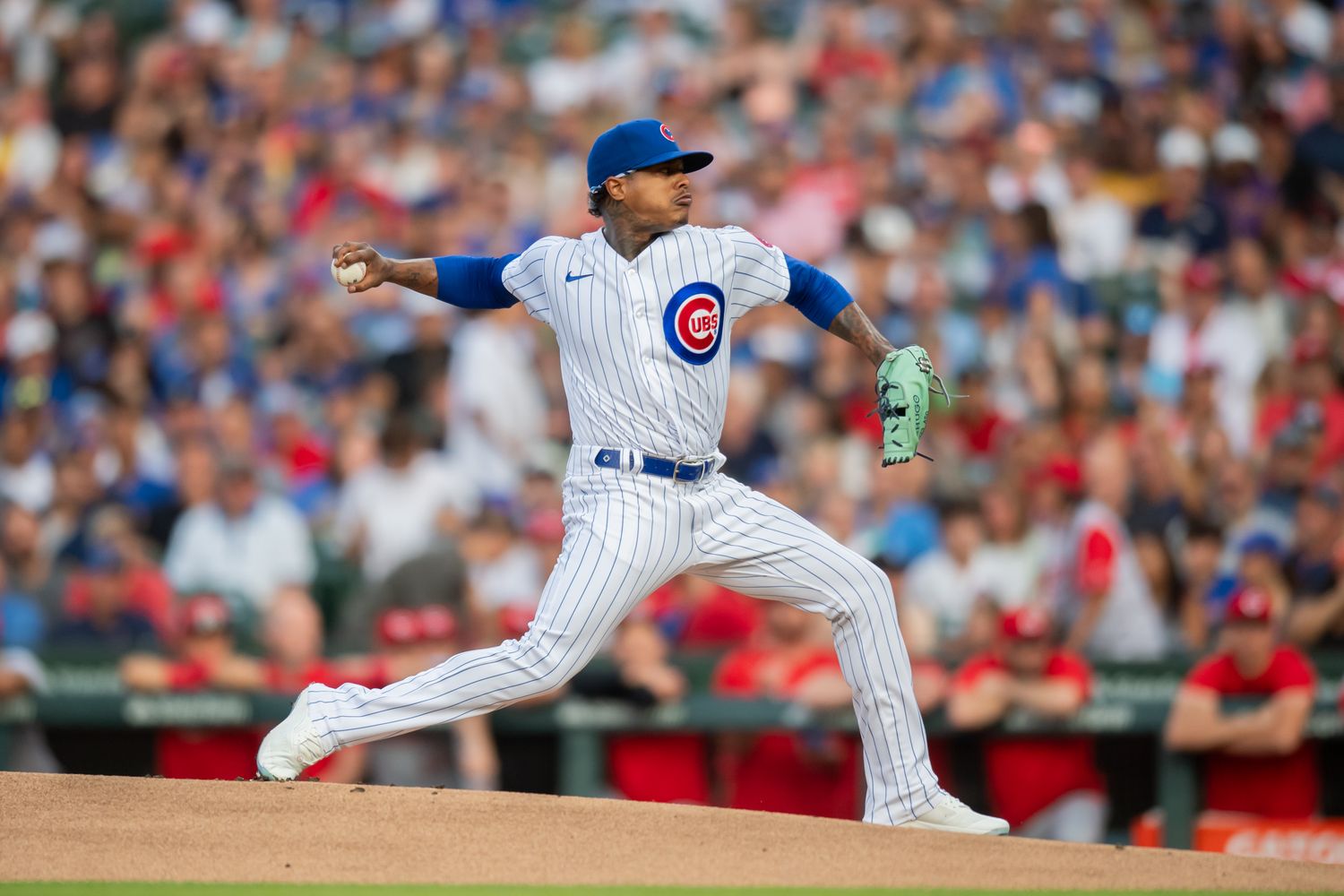 Jul 31, 2023; Chicago, Illinois, USA; Chicago Cubs starting pitcher Marcus Stroman (0) pitches during the first inning against the Cincinnati Reds at Wrigley Field. Mandatory Credit: Patrick Gorski-USA TODAY Sports  
