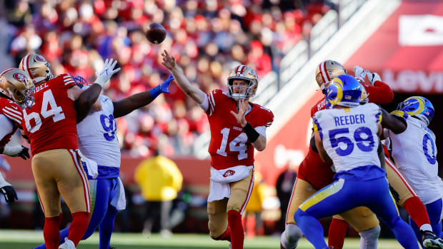 Jan 7, 2024; Santa Clara, California, USA; San Francisco 49ers quarterback Sam Darnold (14) throws a pass during the second quarter against the Los Angeles Rams at Levi's Stadium. Mandatory Credit: Sergio Estrada-USA TODAY Sports