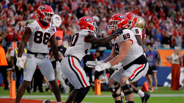 Dec 30, 2023; Miami Gardens, FL, USA; Georgia Bulldogs running back Daijun Edwards (30) reacts after scoring a touchdown against the Florida State Seminoles during the first half in the 2023 Orange Bowl at Hard Rock Stadium. (Sam Navarro / USA TODAY Sports).
