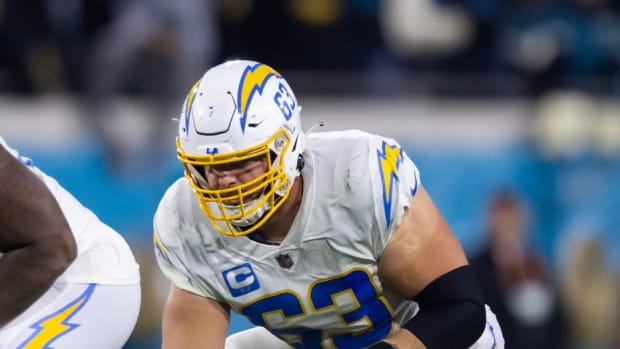 Jan 14, 2023; Jacksonville, Florida, USA; Los Angeles Chargers center Corey Linsley (63) against the Jacksonville Jaguars during a wild card playoff game at TIAA Bank Field. Mandatory Credit: Mark J. Rebilas-USA TODAY Sports  