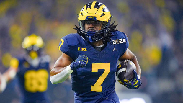 Michigan Wolverines running back Donovan Edwards scores a touchdown vs. the Washington Huskies in the CFP National Championship