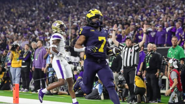 Jan 8, 2024; Houston, TX, USA; Michigan running back Donovan Edwards runs for a touchdown during the first half of the CFP college football national championship game at NRG Stadium in Houston, Texas on Monday, Jan. 8, 2024.