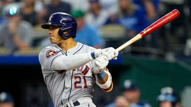 Sep 15, 2023; Kansas City, Missouri, USA; Houston Astros shortstop Jeremy Pena (21) hits single during the first inning against the Kansas City Royals at Kauffman Stadium. Mandatory Credit: Jay Biggerstaff-USA TODAY Sports