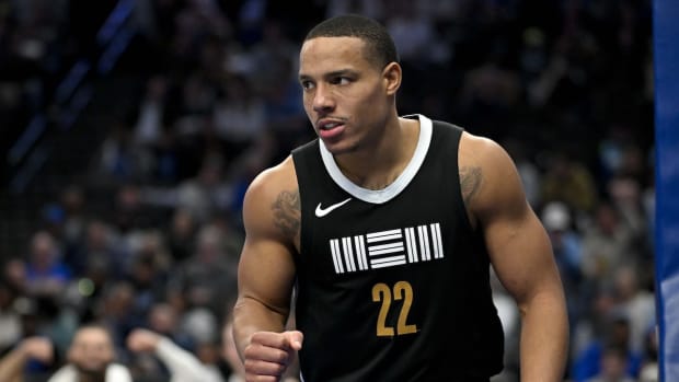 Jan 9, 2024; Dallas, Texas, USA; Memphis Grizzlies guard Desmond Bane (22) reacts to making a shot against the Dallas Mavericks during the second half at the American Airlines Center. Mandatory Credit: Jerome Miron-USA TODAY Sports