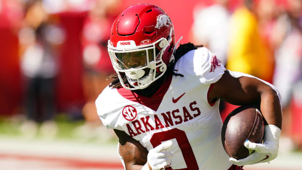 Oct 14, 2023; Tuscaloosa, Alabama, USA; Arkansas Razorbacks running back AJ Green (0) carries the ball against the Alabama Crimson Tide during the second half at Bryant-Denny Stadium. Mandatory Credit: John David Mercer-USA TODAY Sports