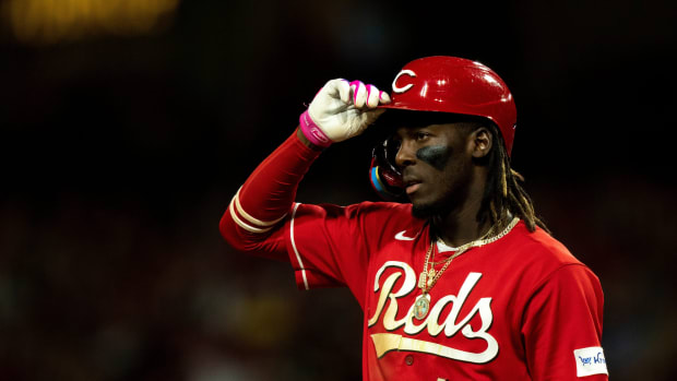 Cincinnati Reds shortstop Elly De La Cruz (44) adjusts his helmet during his at bat in the fifth inning of the MLB baseball game between the Cincinnati Reds and the Pittsburgh Pirates at Great American Ball Park in Cincinnati on Saturday, Sept. 23, 2023.  