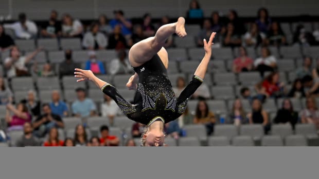 Apr 13, 2023; Fort Worth, TX, USA; University of Missouri gymnast Alisa Sheremeta performs on beam during the NCAA Women's National Gymnastics Tournament Semifinal at Dickies Arena. Mandatory Credit: Jerome Miron-USA TODAY Sports