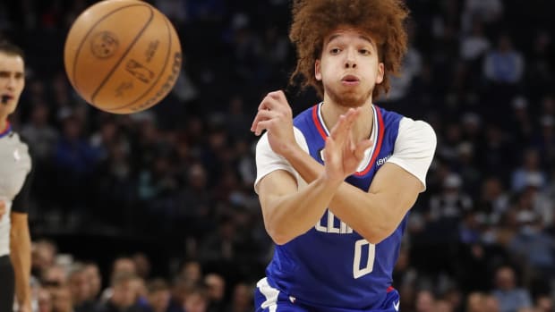 Los Angeles Clippers guard Jason Preston (0) passes the ball against the Minnesota Timberwolves in the fourth quarter at Target Center.