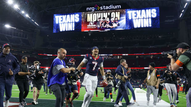 Houston Texans quarterback C.J. Stroud (7) jogs off the field after a 2024 AFC wild card game against the Cleveland Browns at NRG Stadium.