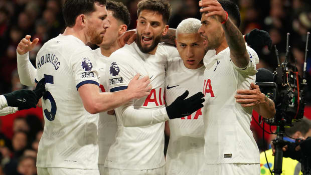 Tottenham's players pictured celebrating a goal during a Premier League away game at Manchester United in January 2024