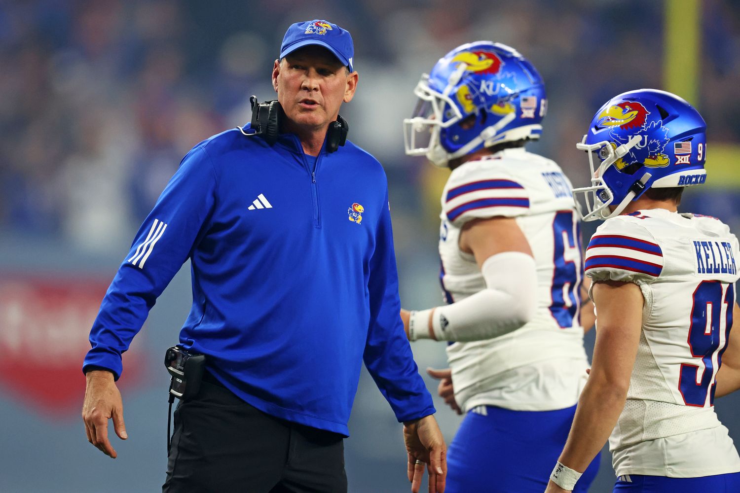 Dec 26, 2023; Phoenix, AZ, USA; Kansas Jayhawks head coach Lance Leipold looks on during the first quarter against the UNLV Rebels in the Guaranteed Rate Bowl at Chase Field. Mandatory Credit: Mark J. Rebilas-USA TODAY Sports  