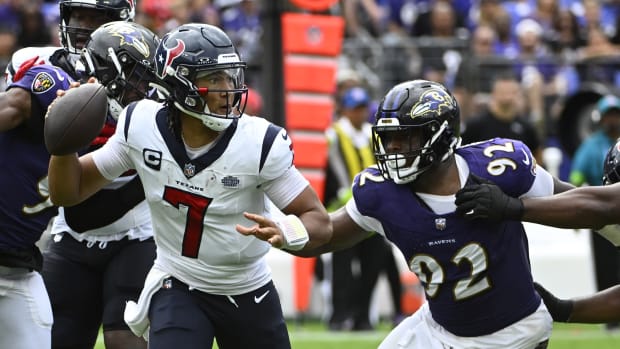 Sep 10, 2023; Baltimore, Maryland, USA; Houston Texans quarterback C.J. Stroud (7) attempts a pass as Baltimore Ravens defensive tackle Rayshad Nichols (91) rushes during the second half at M&T Bank Stadium. 