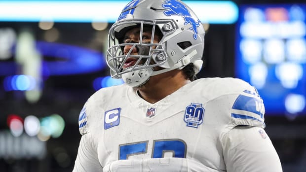 Detroit Lions offensive tackle Penei Sewell (58) warms up before the Dallas Cowboys game at AT&T Stadium in Arlington, Texas on Saturday, Dec. 30, 2023.