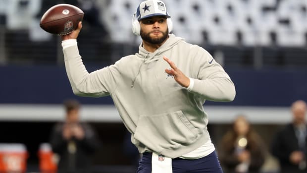 Jan 14, 2024; Arlington, Texas, USA; Dallas Cowboys quarterback Dak Prescott (4) prepares for the game against the Green Bay Packers before the 2024 NFC wild card game at AT&T Stadium. Mandatory Credit: Kevin Jairaj-USA TODAY Sports  