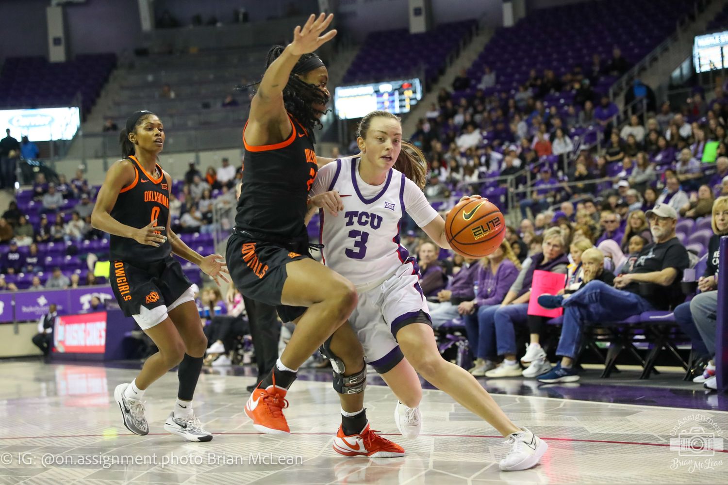 Madison Conner drives to the basket versus Oklahoma State.