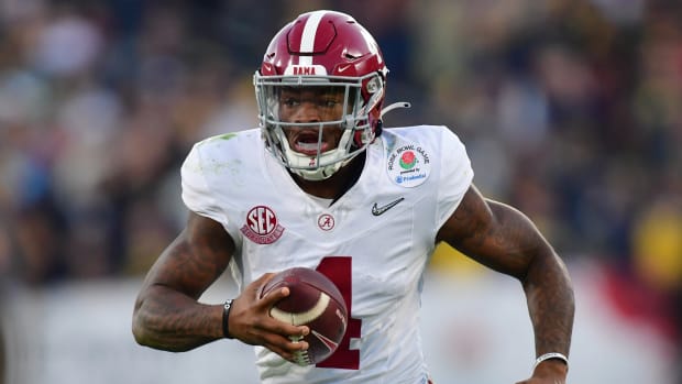 Jan 1, 2024; Pasadena, CA, USA; Alabama Crimson Tide quarterback Jalen Milroe (4) runs against the Michigan Wolverines in the third quarter in the 2024 Rose Bowl college football playoff semifinal game at Rose Bowl.