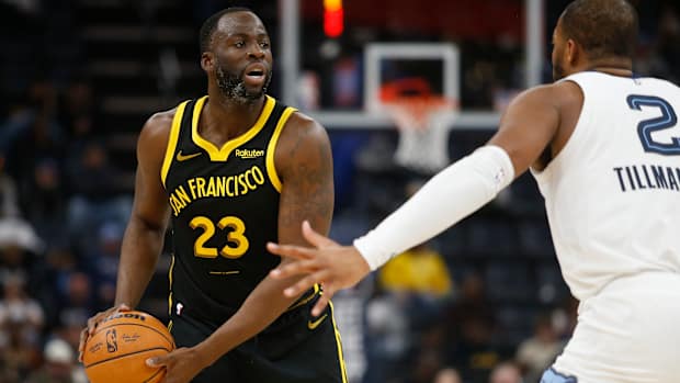 Golden State Warriors forward Draymond Green handles the ball against the Memphis Grizzlies.