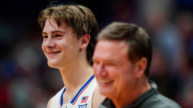 Nov 10, 2023; Lawrence, Kansas, USA; Kansas Jayhawks guard Johnny Furphy (10) and head coach Bill Self react during the second half against the Manhattan Jaspers at Allen Fieldhouse. Mandatory Credit: Jay Biggerstaff-USA TODAY Sports  