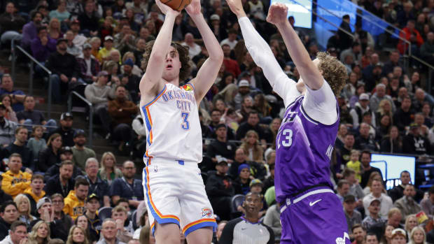 Jan 18, 2024; Salt Lake City, Utah, USA; Oklahoma City Thunder guard Josh Giddey (3) shoots the ball past Utah Jazz forward Lauri Markkanen (23) during the second quarter at Delta Center.