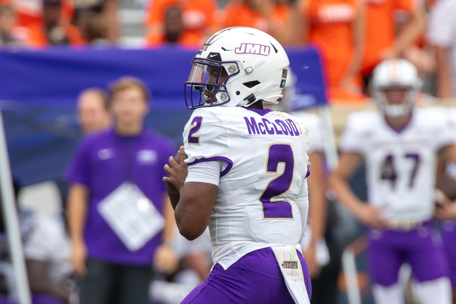 Sept 9, 2023; Charlottesville, Virginia, USA; James Madison Dukes quarterback Jordan McCloud (2) looks for a pass to an open player during the second half of the game against the Virginia Cavaliers at Scott Stadium. Mandatory Credit: Hannah Pajewski-USA TODAY Sports  