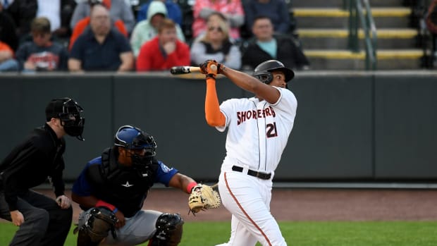 Shorebirds' Samuel Basallo (21) swings in the game against the Cannon Ballers Tuesday, April 11, 2023, at Perdue Stadium in Salisbury, Maryland. The Shorebirds defeated the Cannon Ballers 7-2. Bbm Delmarva Shorebirds Kannapolis Cannon Ballers