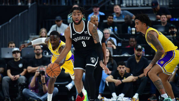Los Angeles Lakers guard D'Moi Hodge (55) steals the ball from Brooklyn Nets forward Trendon Watford (9) during the second half at T-Mobile Arena.