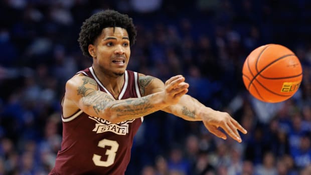 Mississippi State Bulldogs guard Shakeel Moore (3) passes the ball during the first half against the Kentucky Wildcats at Rupp Arena at Central Bank Center