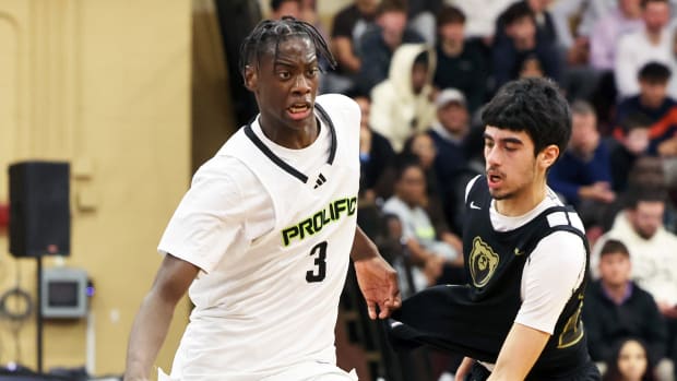 Prolific Prep's AJ Dybantsa dribbles past Orangeville Prep defender Ethan Brown during a game on Wednesday, Jan. 10, 2024.