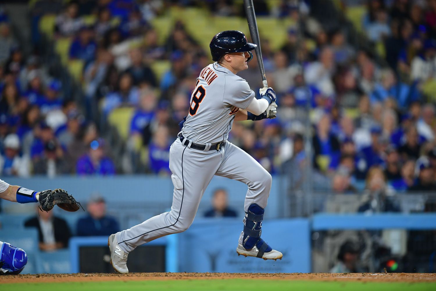 Sep 19, 2023; Los Angeles, California, USA; Detroit Tigers third baseman Tyler Nevin (18) hits a double against the Los Angeles Dodgers during the fifth inning at Dodger Stadium. Mandatory Credit: Gary A. Vasquez-USA TODAY Sports