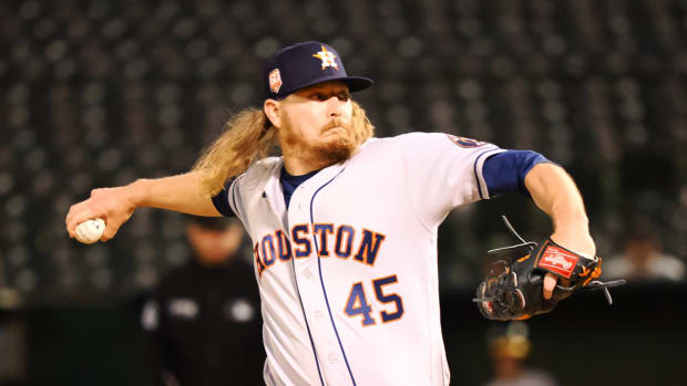 May 31, 2022; Oakland, California, USA; Houston Astros relief pitcher Ryan Stanek (45) pitches the ball against the Oakland Athletics during the sixth inning at RingCentral Coliseum.